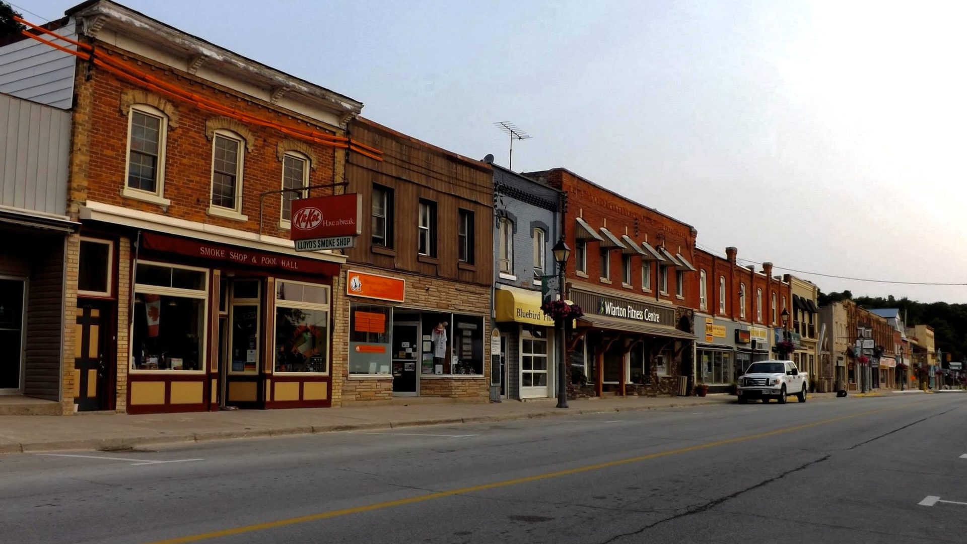 Small-town Canadian main street representing rural dental practice opportunity