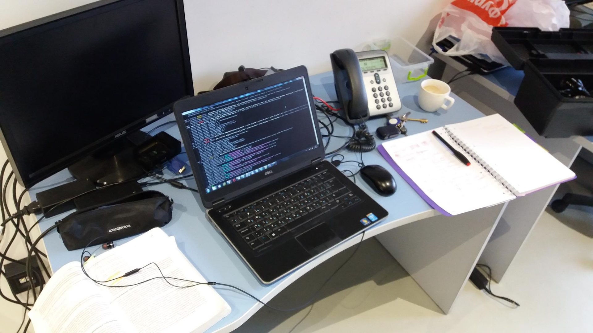 Professional working at a laptop in a home office
