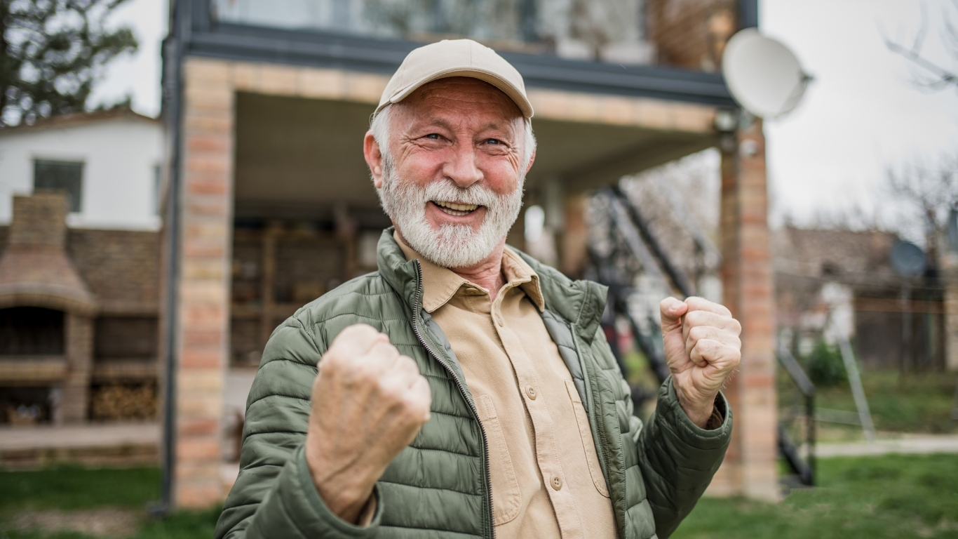Senior couple reviewing healthcare insurance options with advisor